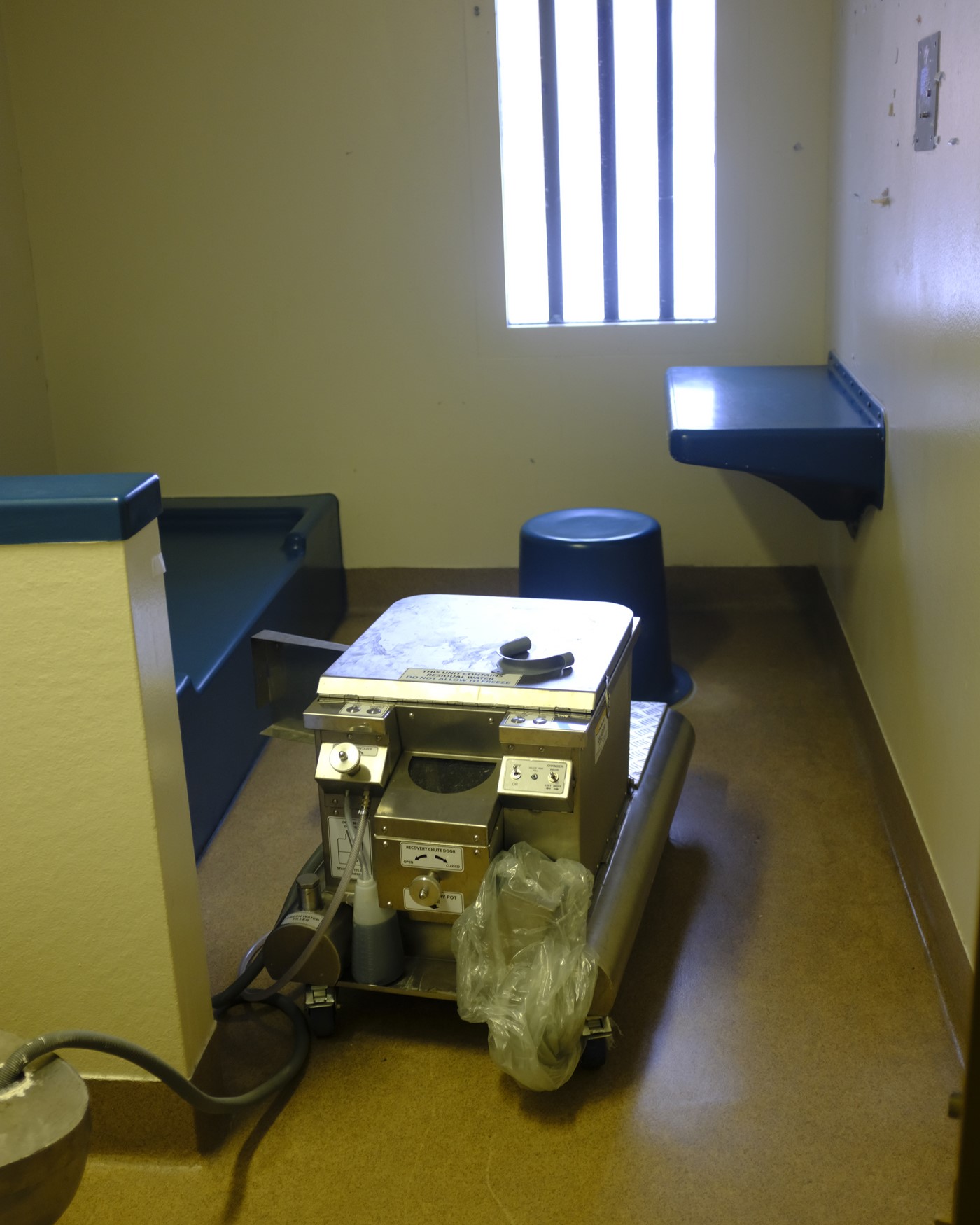 Photos of dry cell toilets at four institutions: Donnacona, Edmonton, Grande Cache, and Stony Mountain.